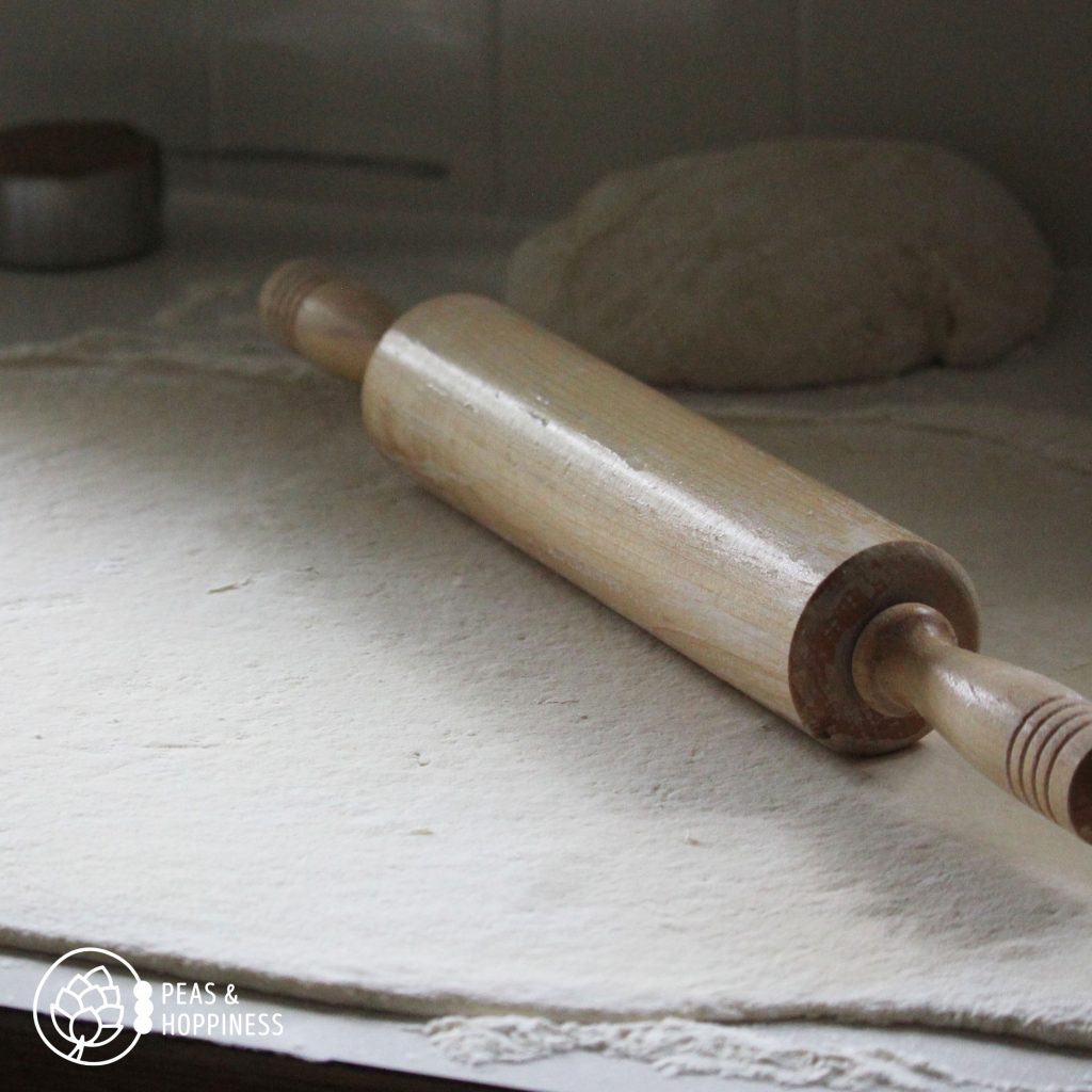 How to make sourdough cinnamon rolls - roll the dough out into a large rectangle