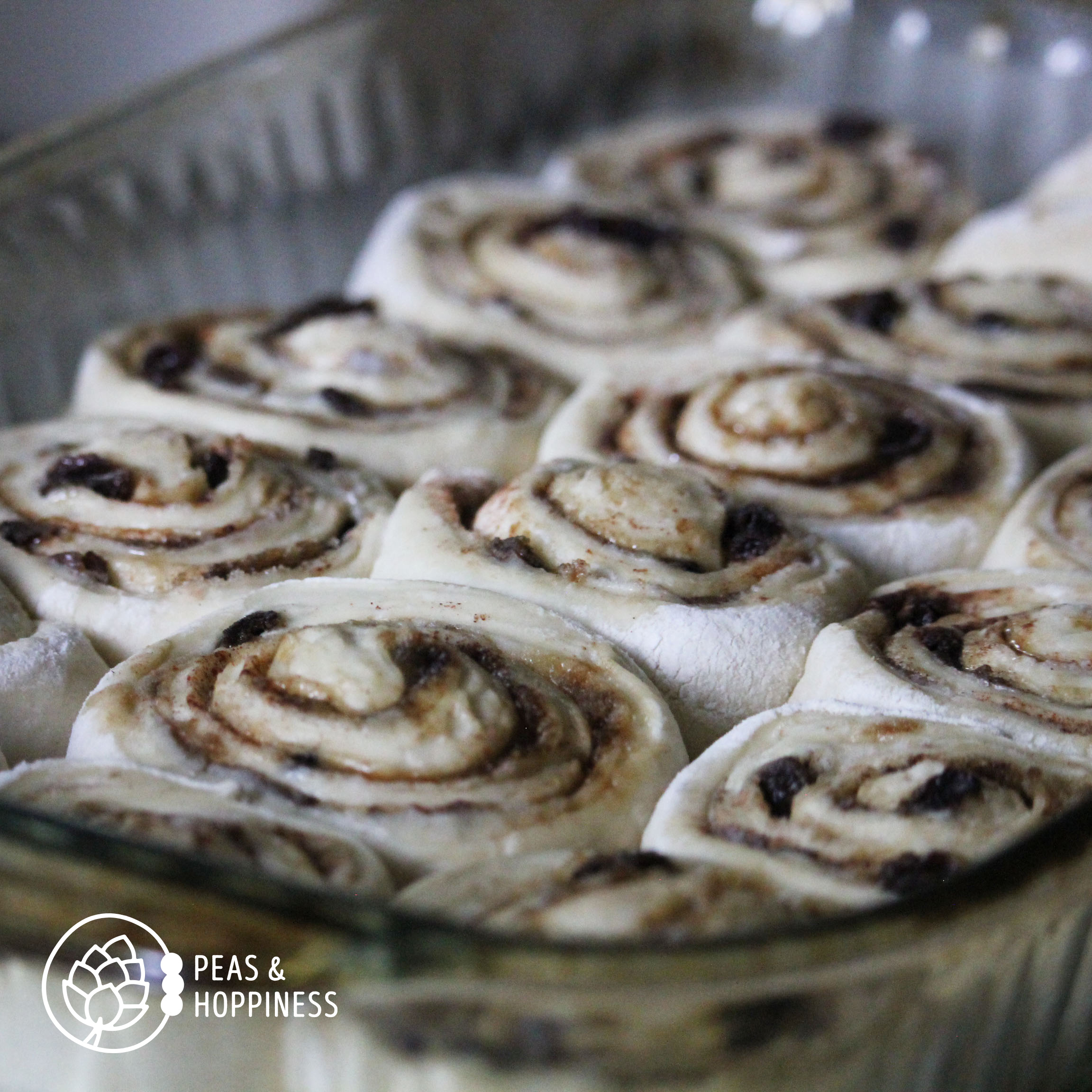 Baking Dish full of Sourdough Cinnamon Rolls Recipe from Peas and Hoppiness - Square