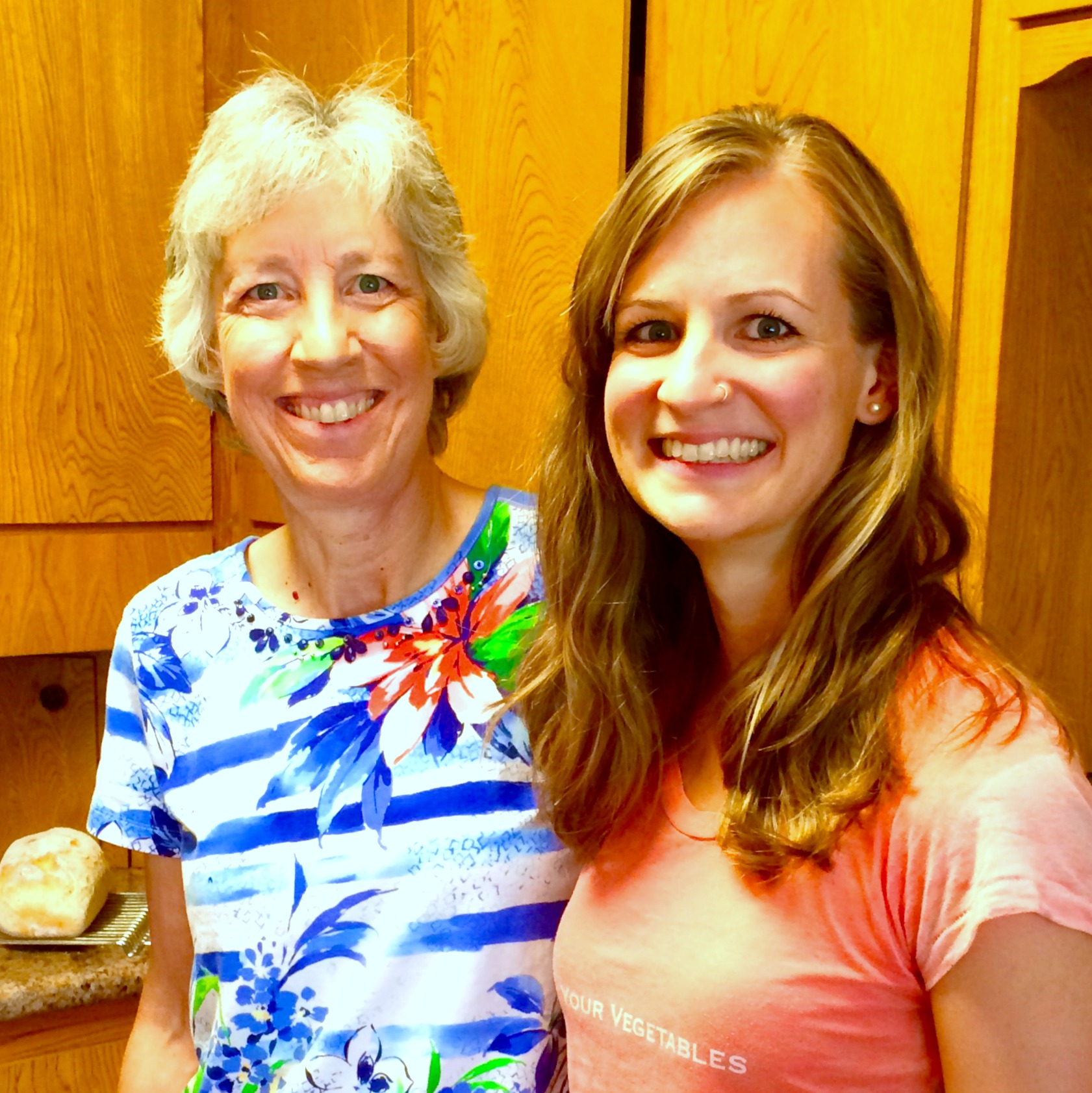 My mom and me, a couple of weeks ago. Yes, that's a loaf of fresh bread behind her.