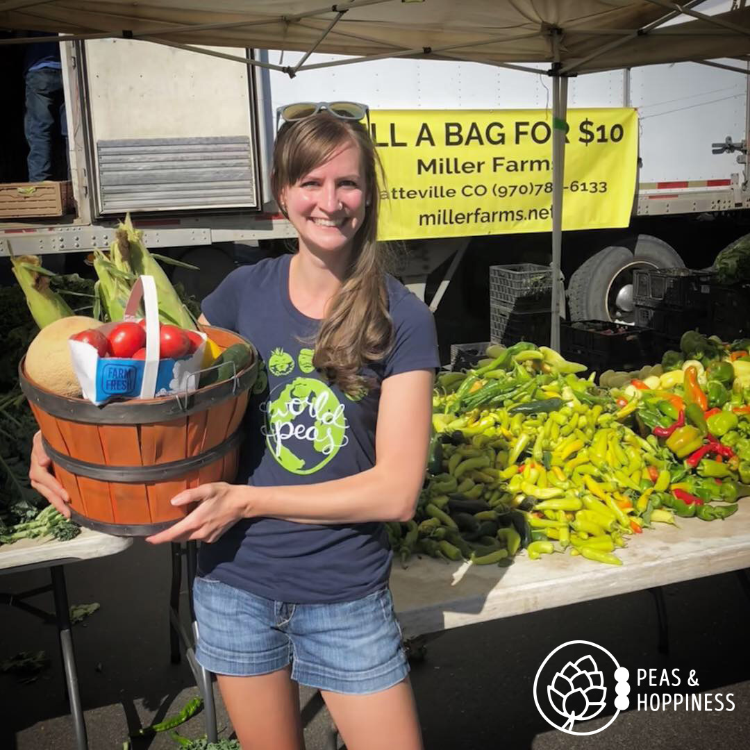 Visiting the Miller Farms booth at the local Farmers’ Market to pick up our basket of CSA veggies last summer! Get your World Peas Tee, too!