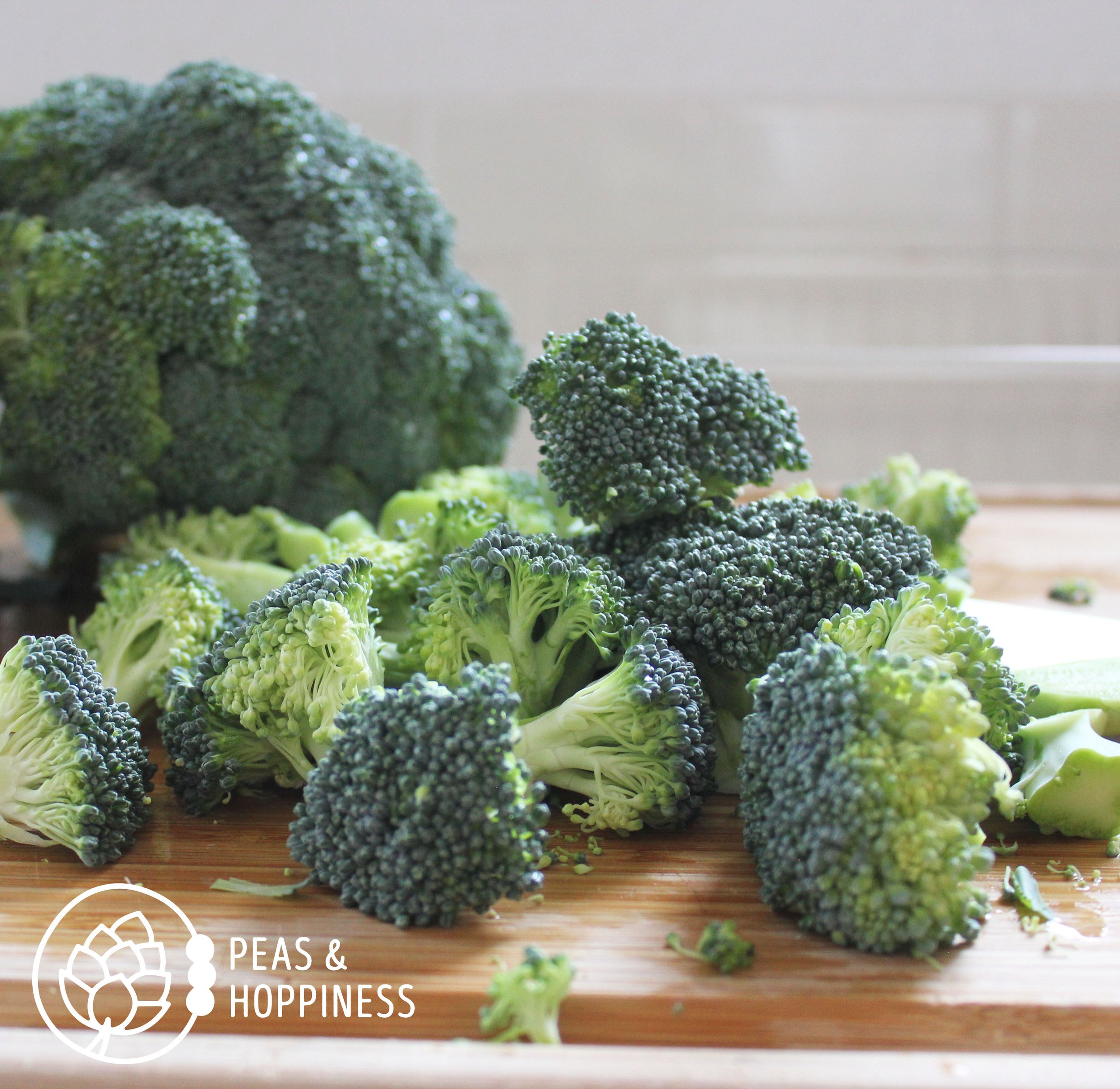 Fresh Broccoli Florets on Cutting Board
