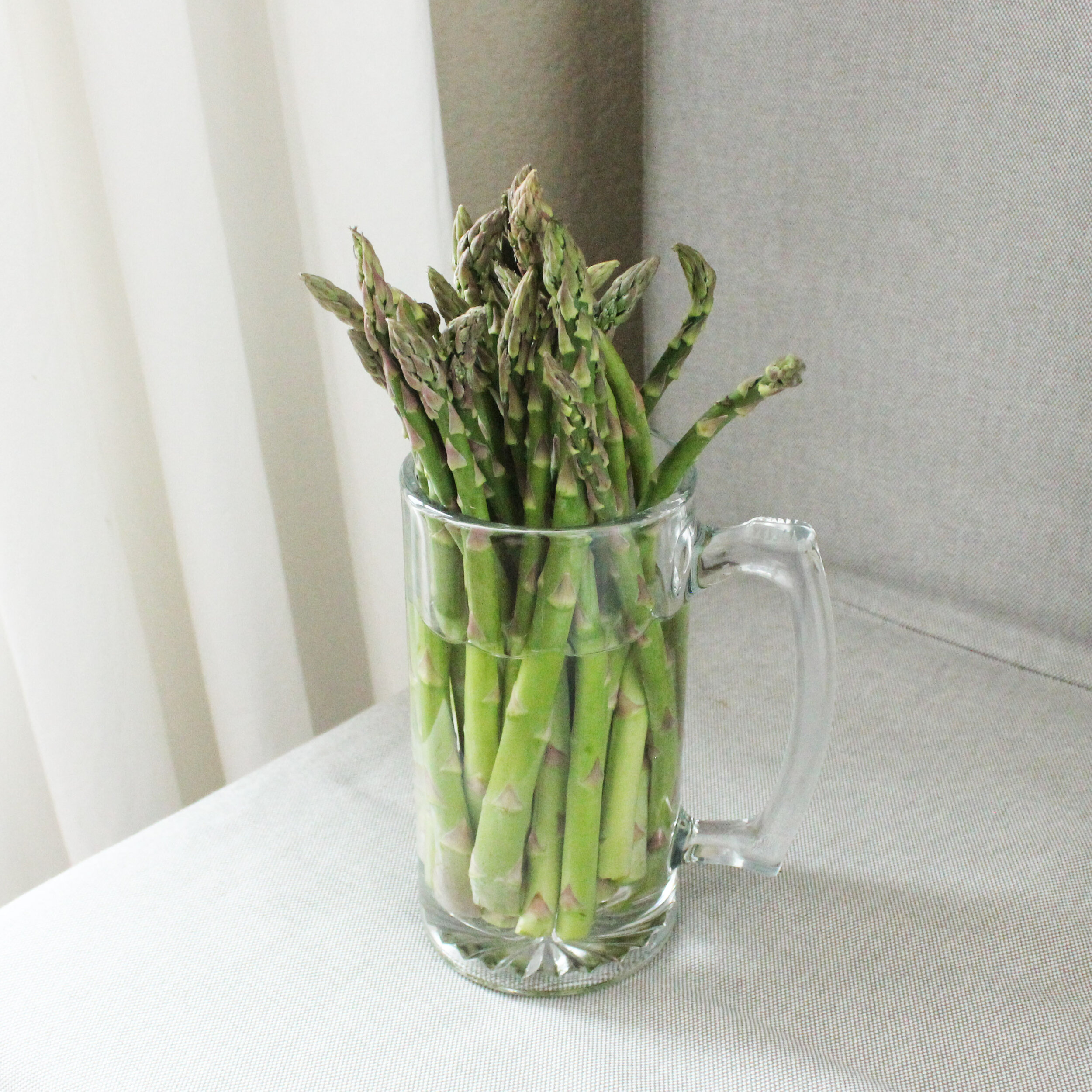 Store fresh asparagus like cut flowers, in a jar or vase with fresh water.