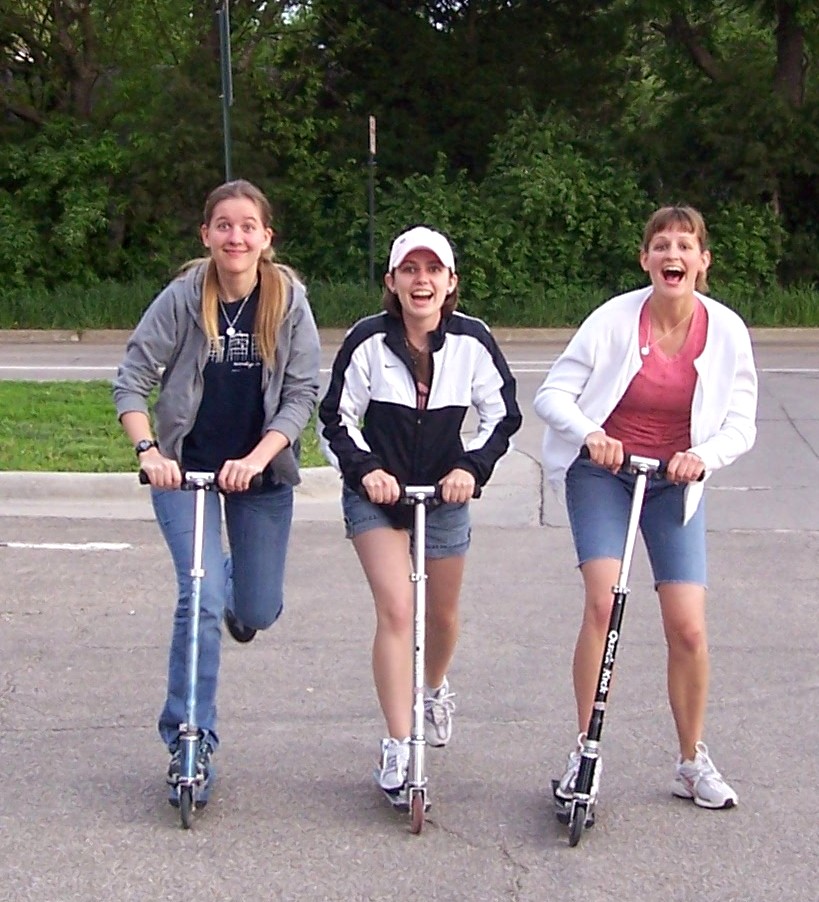 Physical activity with friends - scootering with college roommates. Oh, how did you ever put up with my silliness? Melanie, Meredith, and me, circa 2008